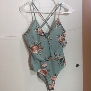 NWT Pale Blue Floral Body Suit